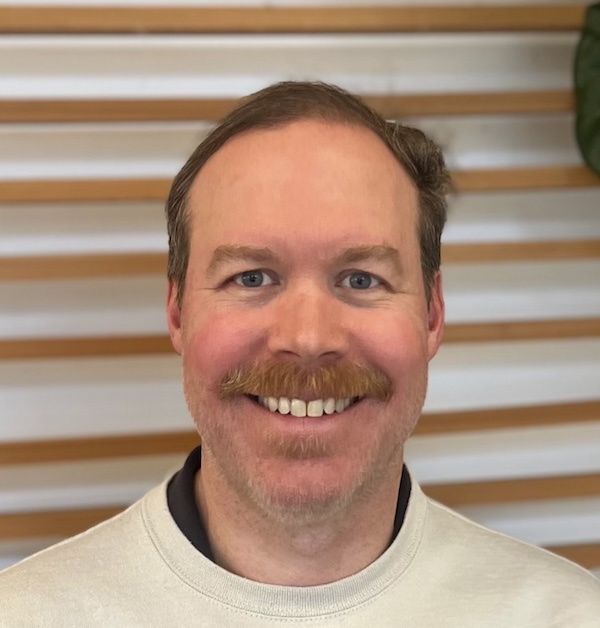 Headshot of Executive Director, Greg Lowenhagen